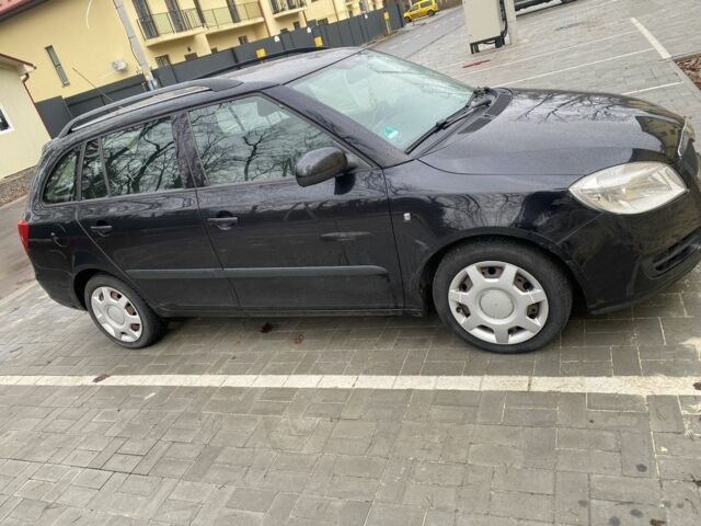 Черный Шкода Фабия, объемом двигателя 1.2 л и пробегом 174 тыс. км за 5193 $, фото 3 на Automoto.ua