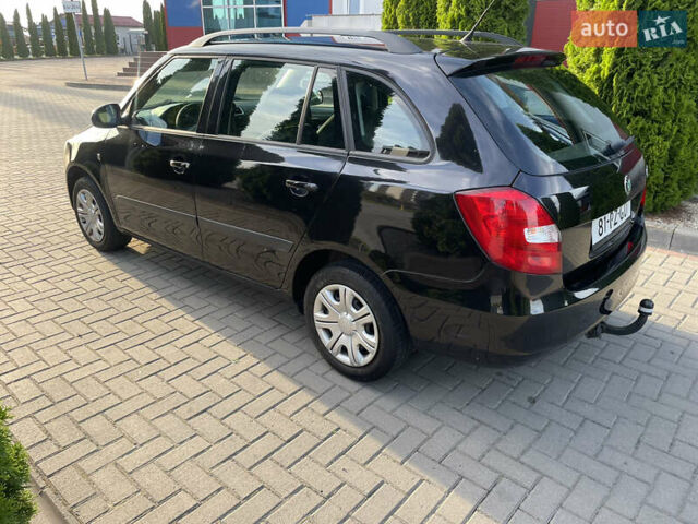 Черный Шкода Фабия, объемом двигателя 1.4 л и пробегом 196 тыс. км за 5950 $, фото 8 на Automoto.ua