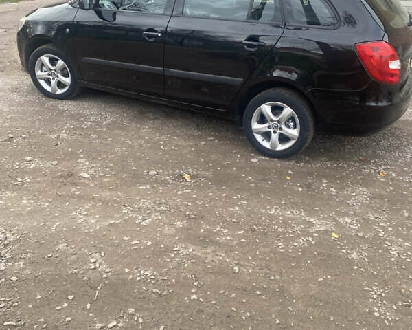 Черный Шкода Фабия, объемом двигателя 1.6 л и пробегом 172 тыс. км за 5950 $, фото 22 на Automoto.ua