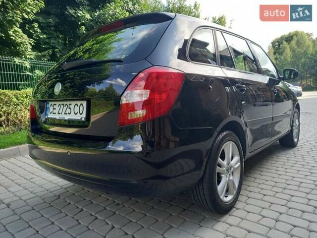 Черный Шкода Фабия, объемом двигателя 1.6 л и пробегом 210 тыс. км за 6500 $, фото 2 на Automoto.ua