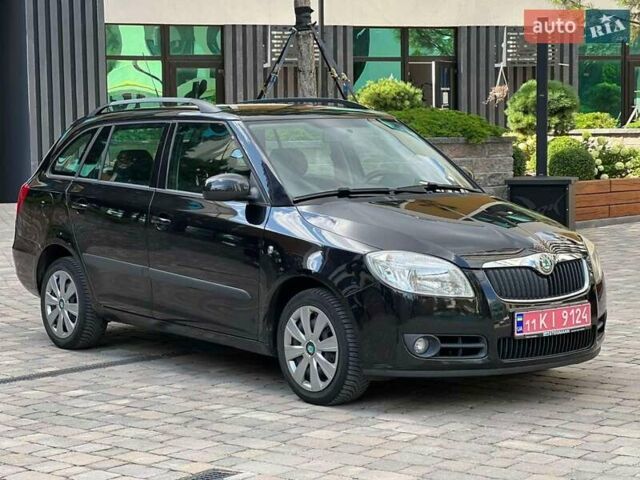 Черный Шкода Фабия, объемом двигателя 1.4 л и пробегом 183 тыс. км за 5500 $, фото 6 на Automoto.ua