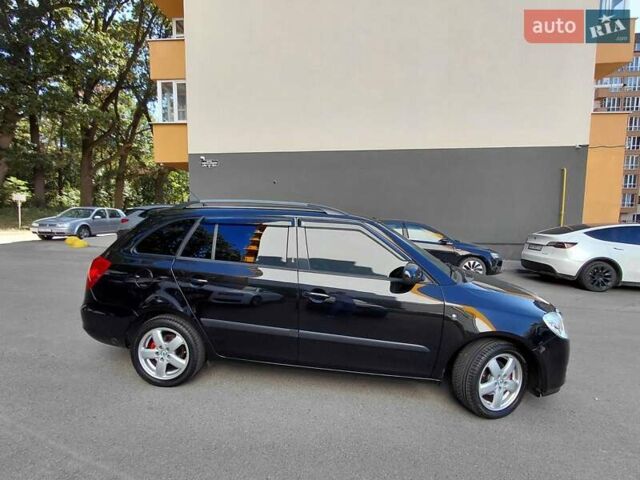 Черный Шкода Фабия, объемом двигателя 1.4 л и пробегом 233 тыс. км за 5300 $, фото 2 на Automoto.ua