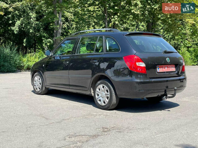 Черный Шкода Фабия, объемом двигателя 1.6 л и пробегом 230 тыс. км за 5499 $, фото 4 на Automoto.ua
