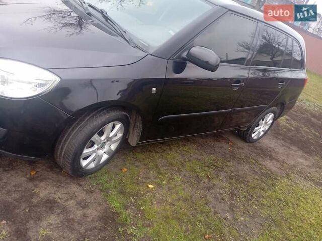 Черный Шкода Фабия, объемом двигателя 1.39 л и пробегом 186 тыс. км за 4750 $, фото 5 на Automoto.ua