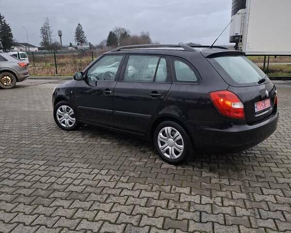Черный Шкода Фабия, объемом двигателя 1.39 л и пробегом 227 тыс. км за 5499 $, фото 2 на Automoto.ua