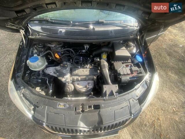 Черный Шкода Фабия, объемом двигателя 1.2 л и пробегом 250 тыс. км за 4400 $, фото 11 на Automoto.ua