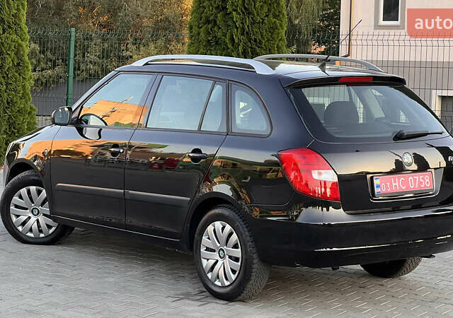 Черный Шкода Фабия, объемом двигателя 1.4 л и пробегом 195 тыс. км за 5850 $, фото 4 на Automoto.ua