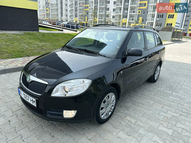 Черный Шкода Фабия, объемом двигателя 1.6 л и пробегом 230 тыс. км за 5999 $, фото 4 на Automoto.ua