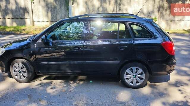 Черный Шкода Фабия, объемом двигателя 1.4 л и пробегом 183 тыс. км за 5500 $, фото 24 на Automoto.ua