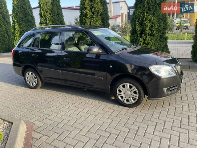 Черный Шкода Фабия, объемом двигателя 1.4 л и пробегом 196 тыс. км за 5950 $, фото 4 на Automoto.ua