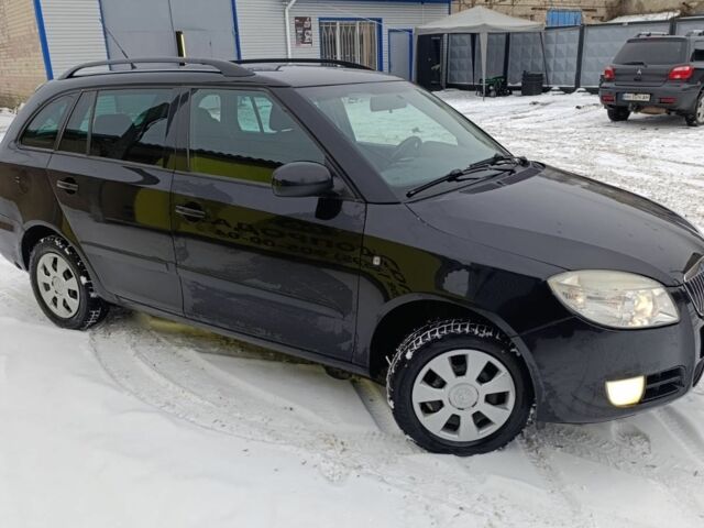 Черный Шкода Фабия, объемом двигателя 1.4 л и пробегом 260 тыс. км за 4550 $, фото 4 на Automoto.ua