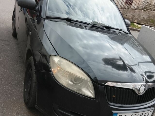 Черный Шкода Фабия, объемом двигателя 1.2 л и пробегом 317 тыс. км за 3300 $, фото 1 на Automoto.ua