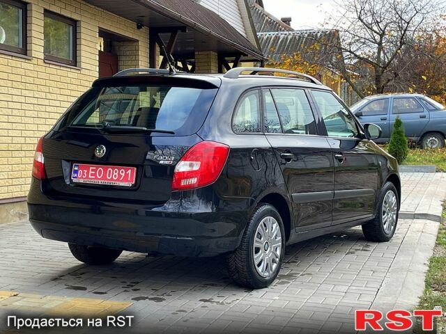 Черный Шкода Фабия, объемом двигателя 1.6 л и пробегом 185 тыс. км за 6100 $, фото 11 на Automoto.ua
