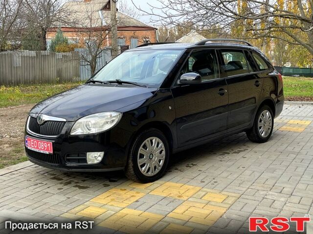 Черный Шкода Фабия, объемом двигателя 1.6 л и пробегом 185 тыс. км за 6100 $, фото 5 на Automoto.ua