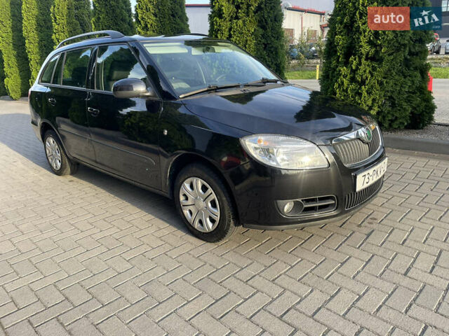 Черный Шкода Фабия, объемом двигателя 1.4 л и пробегом 196 тыс. км за 5950 $, фото 3 на Automoto.ua
