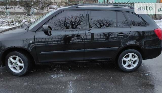 Черный Шкода Фабия, объемом двигателя 1.39 л и пробегом 215 тыс. км за 5100 $, фото 10 на Automoto.ua