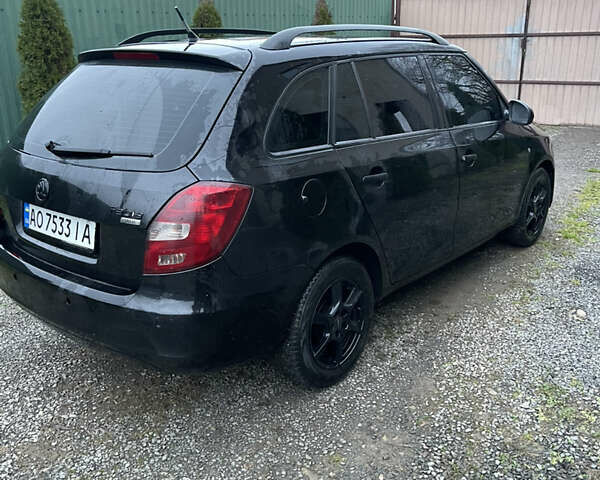 Черный Шкода Фабия, объемом двигателя 1.42 л и пробегом 243 тыс. км за 5000 $, фото 2 на Automoto.ua