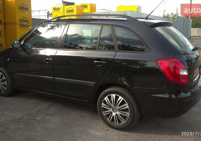 Черный Шкода Фабия, объемом двигателя 1.39 л и пробегом 204 тыс. км за 6200 $, фото 3 на Automoto.ua