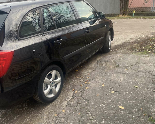 Черный Шкода Фабия, объемом двигателя 1.6 л и пробегом 172 тыс. км за 5950 $, фото 4 на Automoto.ua