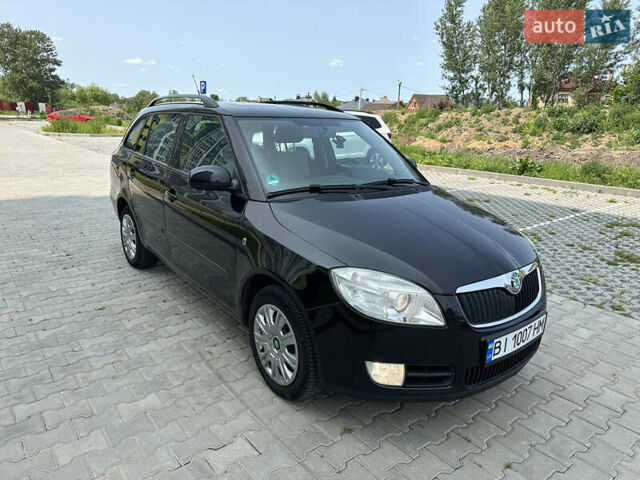 Черный Шкода Фабия, объемом двигателя 1.6 л и пробегом 230 тыс. км за 5999 $, фото 21 на Automoto.ua