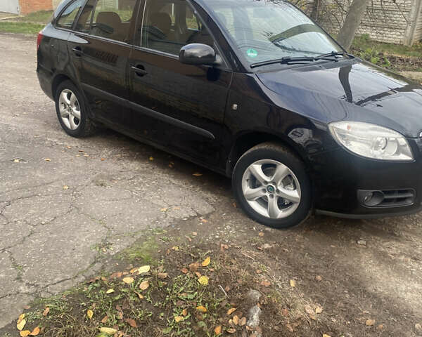 Черный Шкода Фабия, объемом двигателя 1.6 л и пробегом 172 тыс. км за 5950 $, фото 5 на Automoto.ua