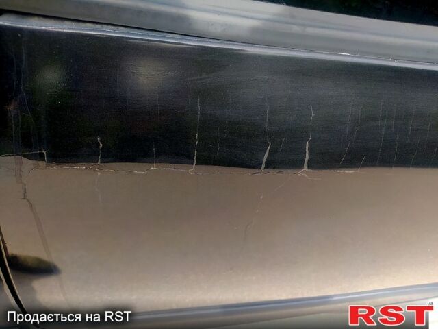 Черный Шкода Фабия, объемом двигателя 1.2 л и пробегом 240 тыс. км за 3100 $, фото 3 на Automoto.ua