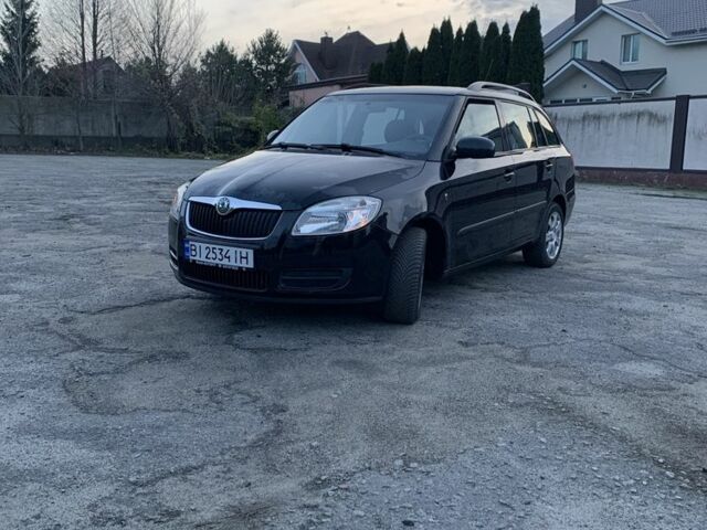 Черный Шкода Фабия, объемом двигателя 1.4 л и пробегом 228 тыс. км за 6999 $, фото 1 на Automoto.ua