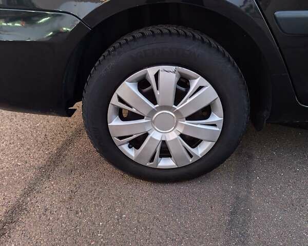 Черный Шкода Фабия, объемом двигателя 1.4 л и пробегом 197 тыс. км за 5800 $, фото 17 на Automoto.ua