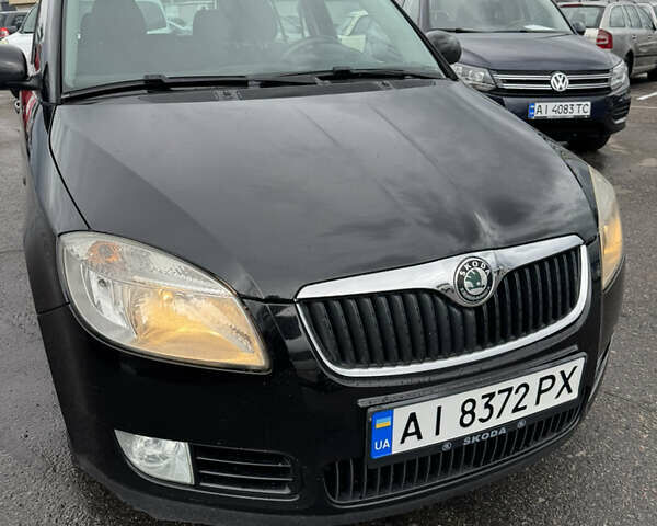 Шкода Фабия 2009 в Белой Церкве на Automoto.ua Черный Шкода Фабия, объемом двигателя 1.42 л и пробегом 210 тыс. км за 5777 $, фото 7 на Automoto.ua