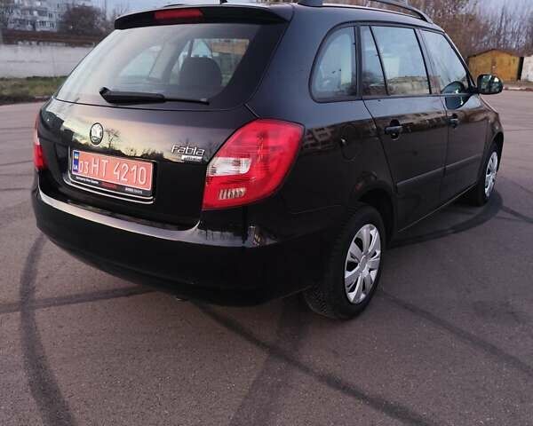 Черный Шкода Фабия, объемом двигателя 1.4 л и пробегом 197 тыс. км за 5800 $, фото 10 на Automoto.ua