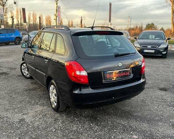 Черный Шкода Фабия, объемом двигателя 1.39 л и пробегом 172 тыс. км за 5999 $, фото 8 на Automoto.ua