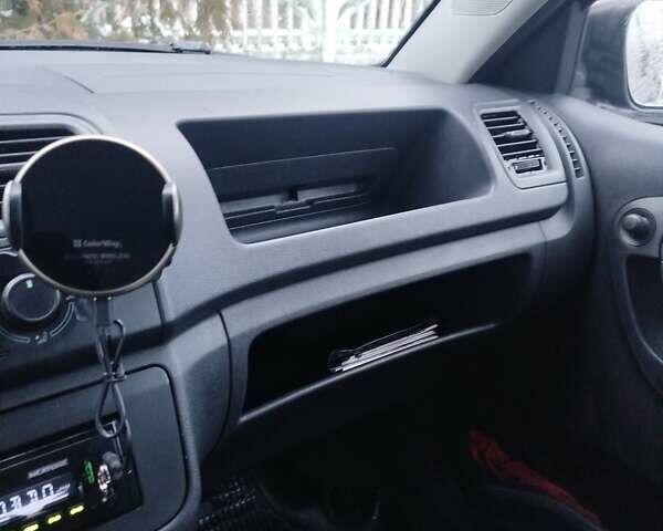 Черный Шкода Фабия, объемом двигателя 1.4 л и пробегом 216 тыс. км за 5200 $, фото 12 на Automoto.ua