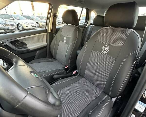 Черный Шкода Фабия, объемом двигателя 1.39 л и пробегом 172 тыс. км за 5999 $, фото 14 на Automoto.ua