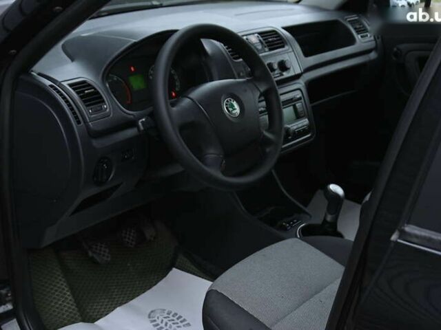 Черный Шкода Фабия, объемом двигателя 1.4 л и пробегом 205 тыс. км за 5600 $, фото 19 на Automoto.ua