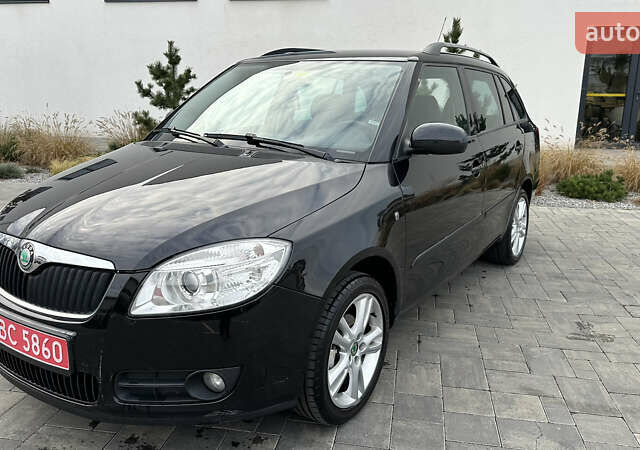 Черный Шкода Фабия, объемом двигателя 1.6 л и пробегом 205 тыс. км за 5800 $, фото 2 на Automoto.ua