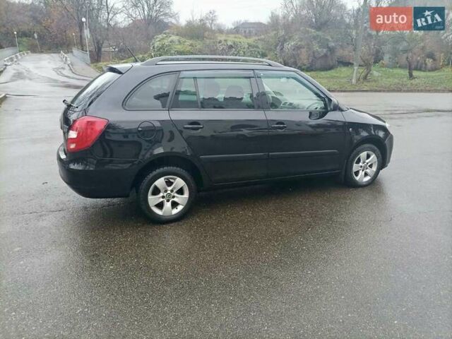 Черный Шкода Фабия, объемом двигателя 1.6 л и пробегом 192 тыс. км за 5800 $, фото 7 на Automoto.ua