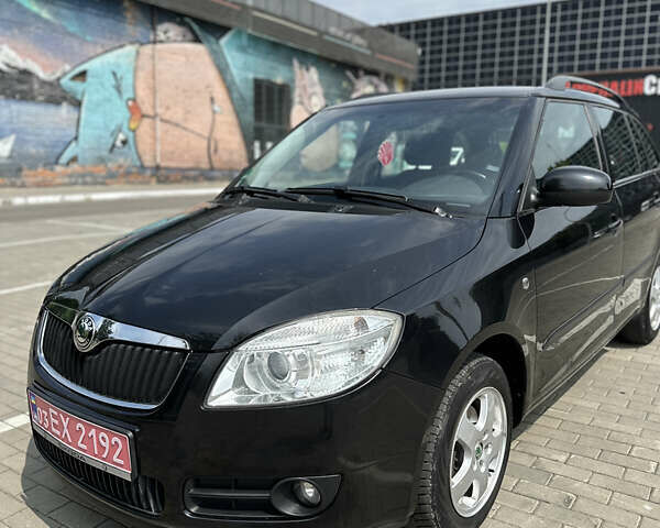 Черный Шкода Фабия, объемом двигателя 1.39 л и пробегом 225 тыс. км за 5650 $, фото 6 на Automoto.ua