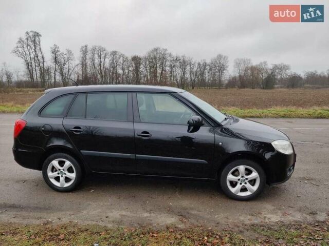 Черный Шкода Фабия, объемом двигателя 1.4 л и пробегом 201 тыс. км за 5750 $, фото 2 на Automoto.ua