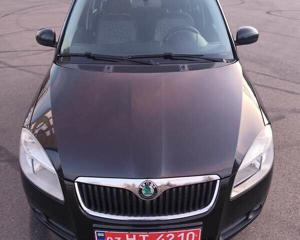 Черный Шкода Фабия, объемом двигателя 1.4 л и пробегом 197 тыс. км за 5800 $, фото 2 на Automoto.ua