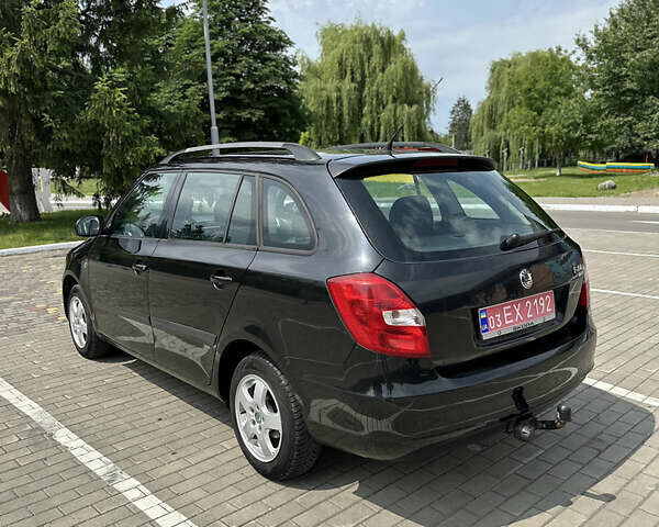 Черный Шкода Фабия, объемом двигателя 1.39 л и пробегом 225 тыс. км за 5650 $, фото 7 на Automoto.ua