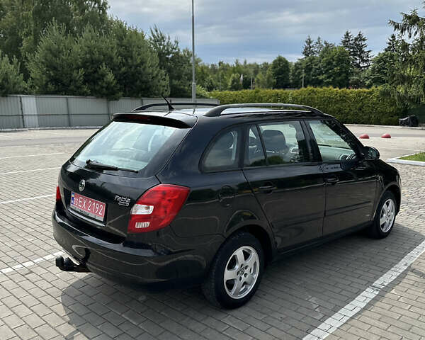 Черный Шкода Фабия, объемом двигателя 1.39 л и пробегом 225 тыс. км за 5650 $, фото 9 на Automoto.ua