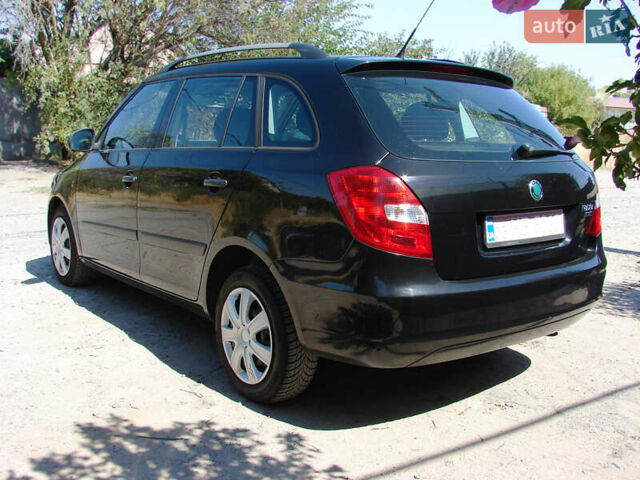 Черный Шкода Фабия, объемом двигателя 1.4 л и пробегом 190 тыс. км за 5500 $, фото 5 на Automoto.ua