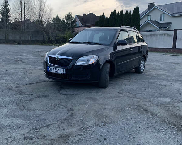 Черный Шкода Фабия, объемом двигателя 1.39 л и пробегом 230 тыс. км за 6999 $, фото 1 на Automoto.ua