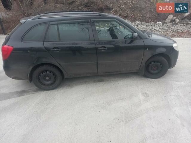 Черный Шкода Фабия, объемом двигателя 1.6 л и пробегом 211 тыс. км за 5500 $, фото 8 на Automoto.ua