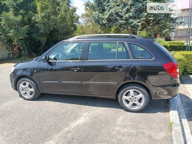 Черный Шкода Фабия, объемом двигателя 1.4 л и пробегом 142 тыс. км за 5450 $, фото 14 на Automoto.ua
