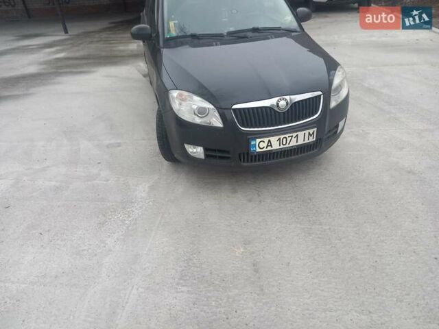 Черный Шкода Фабия, объемом двигателя 1.6 л и пробегом 211 тыс. км за 5500 $, фото 1 на Automoto.ua