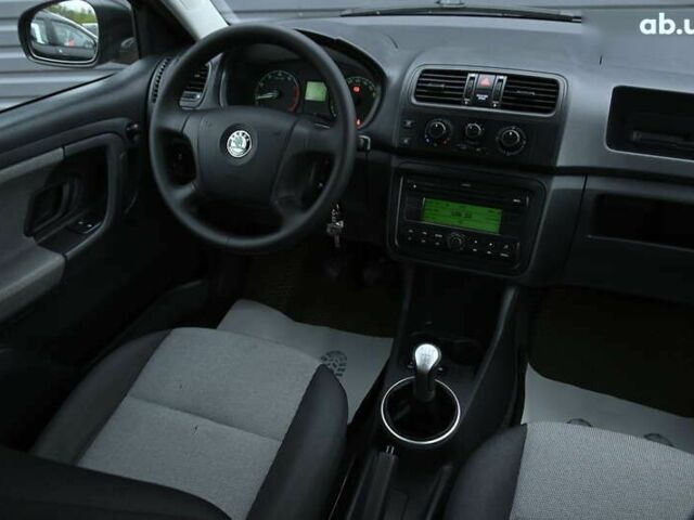 Черный Шкода Фабия, объемом двигателя 1.4 л и пробегом 205 тыс. км за 5600 $, фото 29 на Automoto.ua