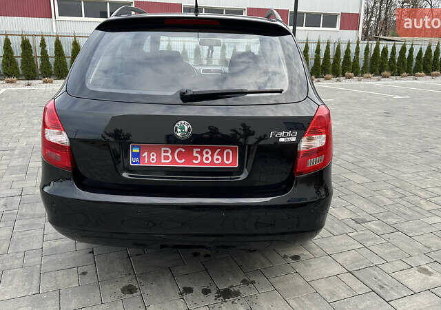 Черный Шкода Фабия, объемом двигателя 1.6 л и пробегом 205 тыс. км за 5800 $, фото 5 на Automoto.ua