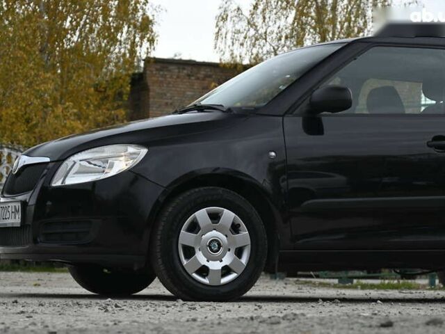 Черный Шкода Фабия, объемом двигателя 1.4 л и пробегом 205 тыс. км за 5600 $, фото 8 на Automoto.ua