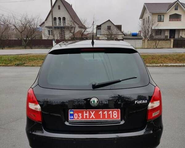 Черный Шкода Фабия, объемом двигателя 1.4 л и пробегом 201 тыс. км за 5750 $, фото 12 на Automoto.ua